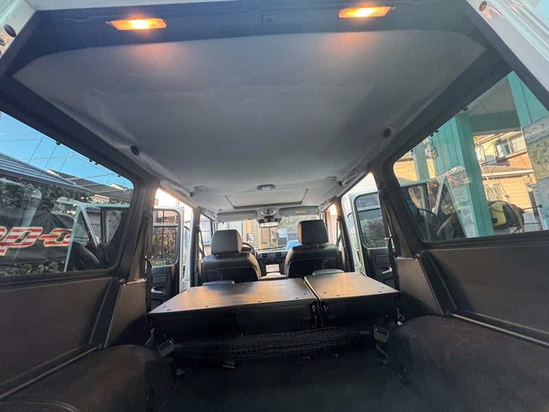 メルセデスベンツ Gクラス 天井張り替え施工前 後部から見た天井の波打ち状態